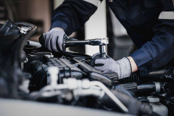 Experienced mechanic inspecting a vehicle